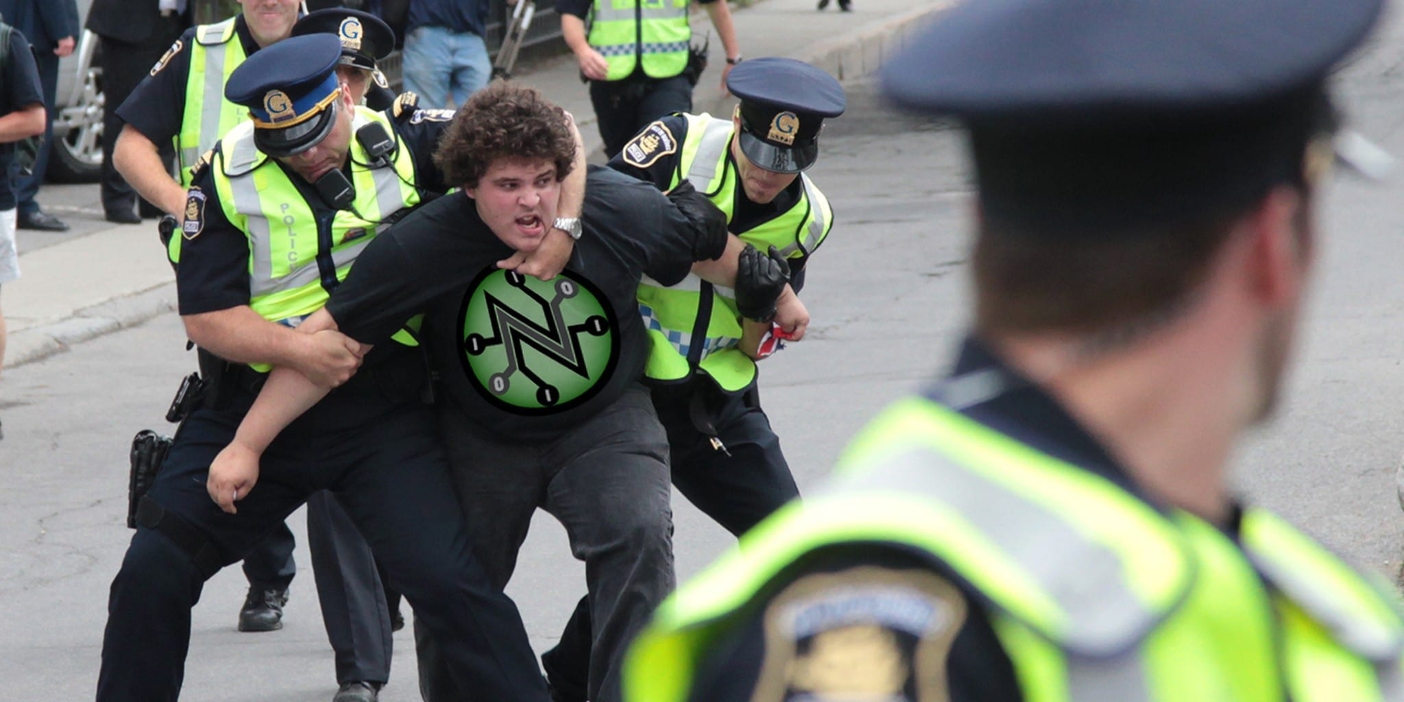 What Is Net Neutrality? A Guide to Understanding the Debate Protestor arrested during net neutrality protest.