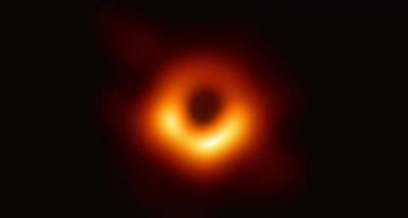 The very first image of a black hole, created by the Event Horizon team.