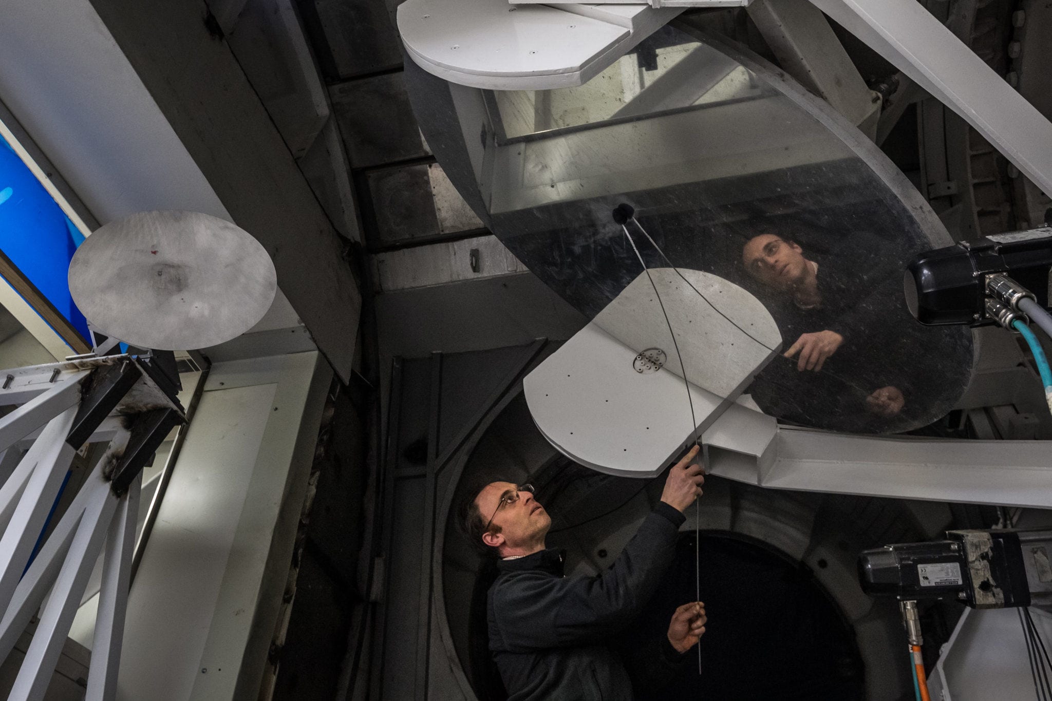 Shep Doeleman, director of the Event Horizon Telescope, adjusts the Large Millimeter Telescope near Puebla, Mexico.